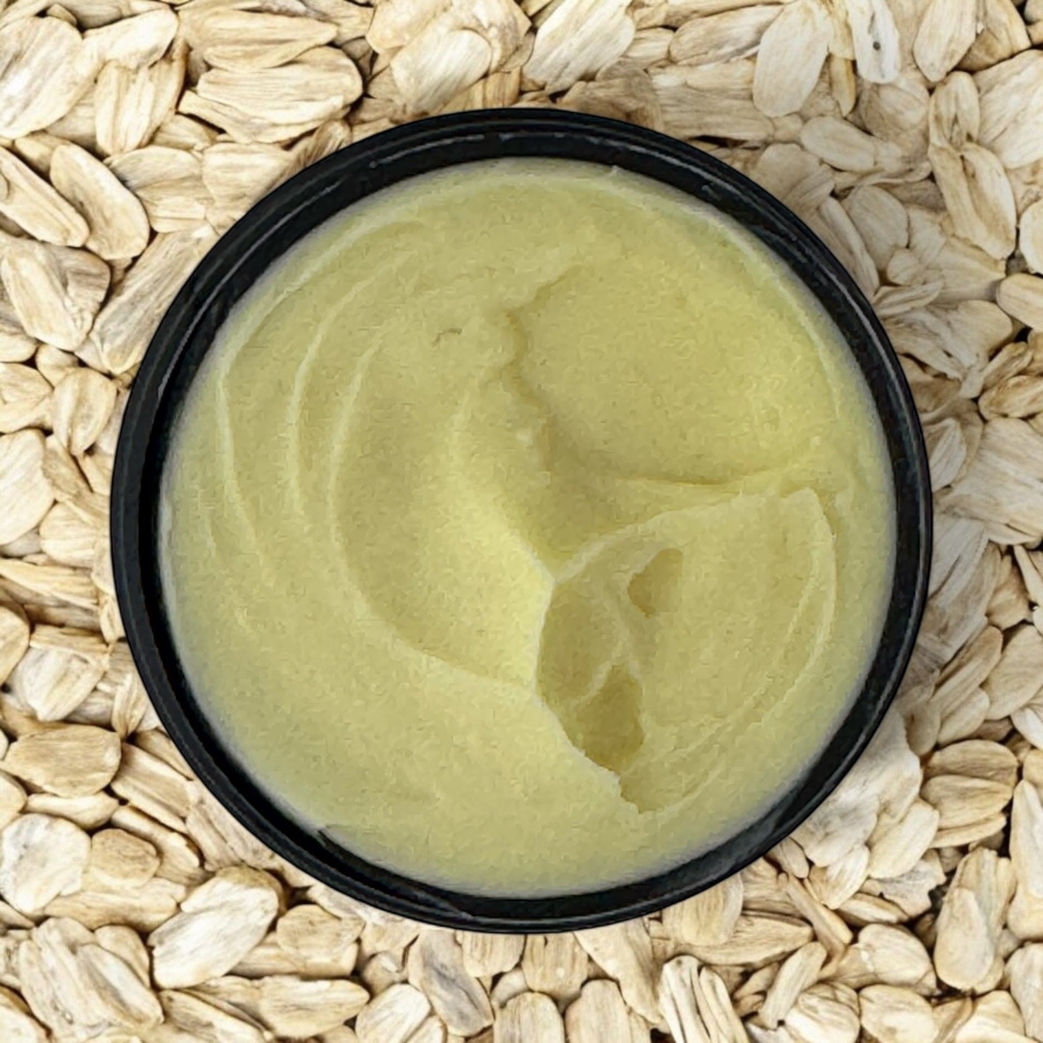 Oat and mandarin cleanser with creamy texture in sustainable packaging surrounded by oat flakes highlighting natural. - Oat & Mandarin Cleanser - PUREMESS SKINCARE