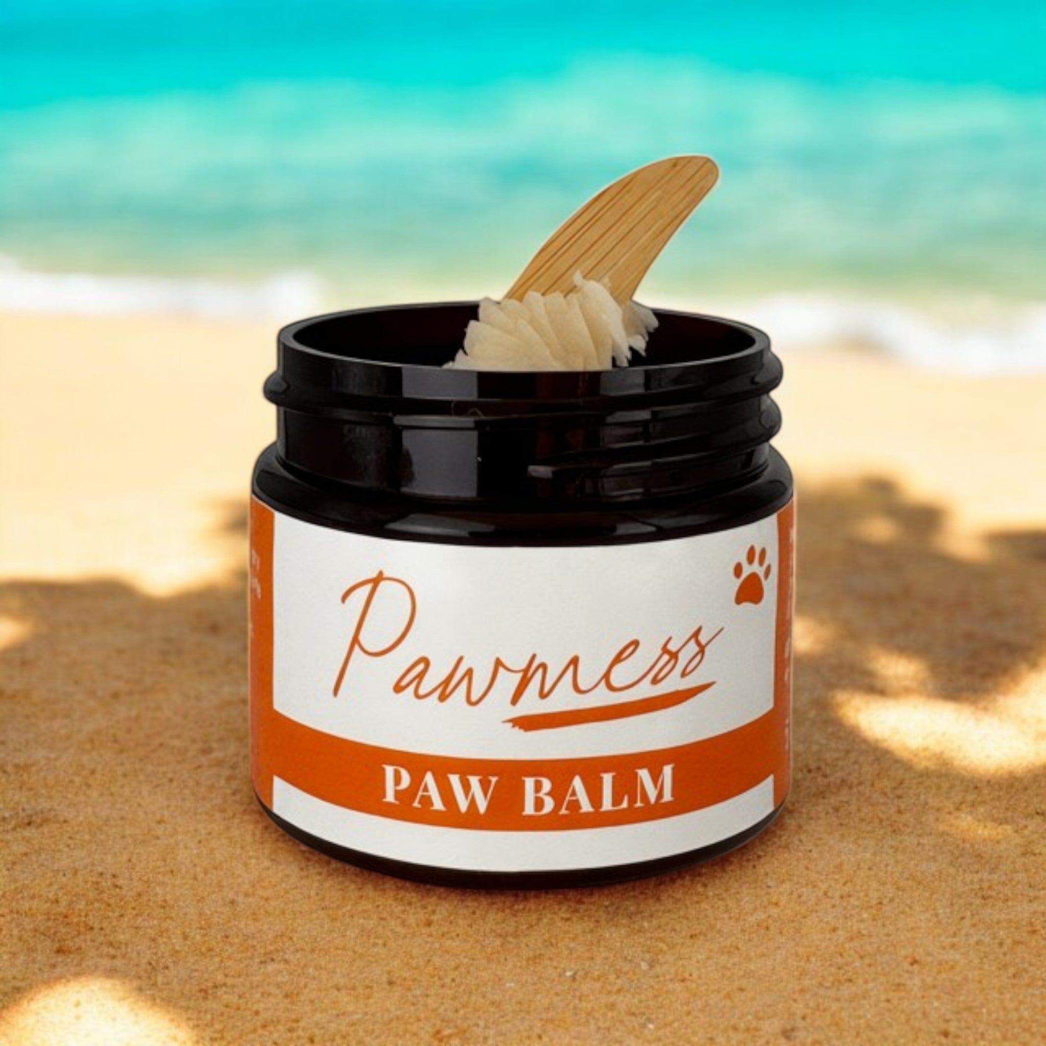 Open dark amber container of Pawmess Paw Balm with wooden spatula, natural skincare with botanical ingredients, sustainable. - Pawmess Paw Balm for Dogs - PUREMESS SKINCARE