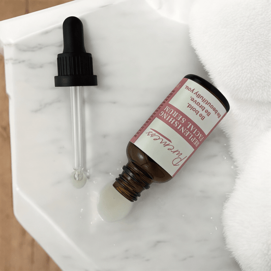 Replenishing Facial Serum with dropper on white marble surface, featuring eco-friendly beauty, botanical ingredients,. - Replenishing Facial Serum - PUREMESS SKINCARE