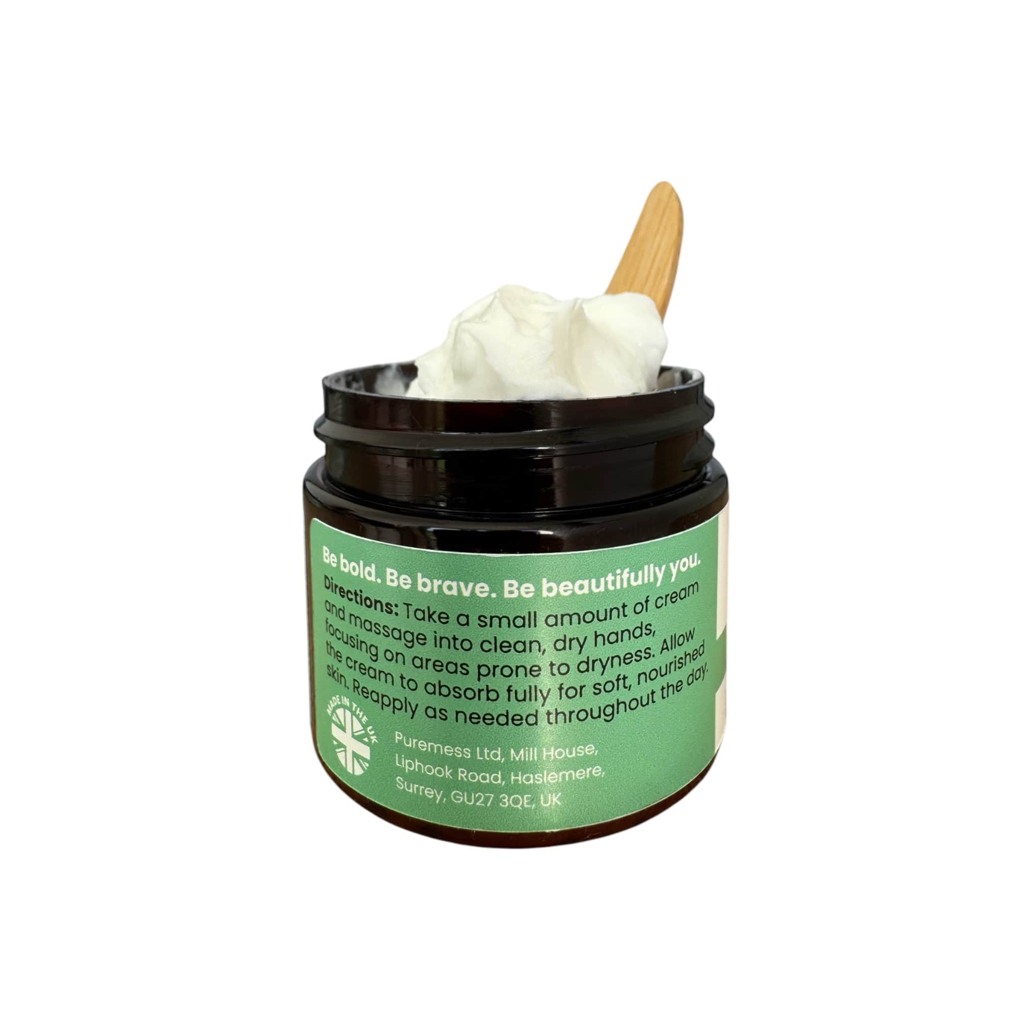 Dark amber container with thick white lemongrass hand cream, wooden spatula, eco-friendly beauty with botanical ingredients. - Lemongrass Hand Cream - PUREMESS SKINCARE
